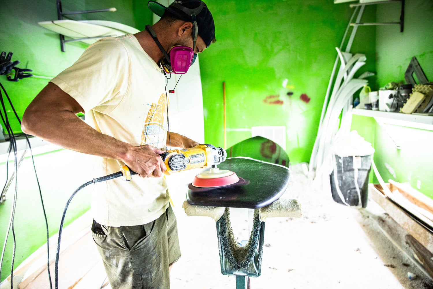 JP Roberts working with a grinding machine>
</div>
<div class=
