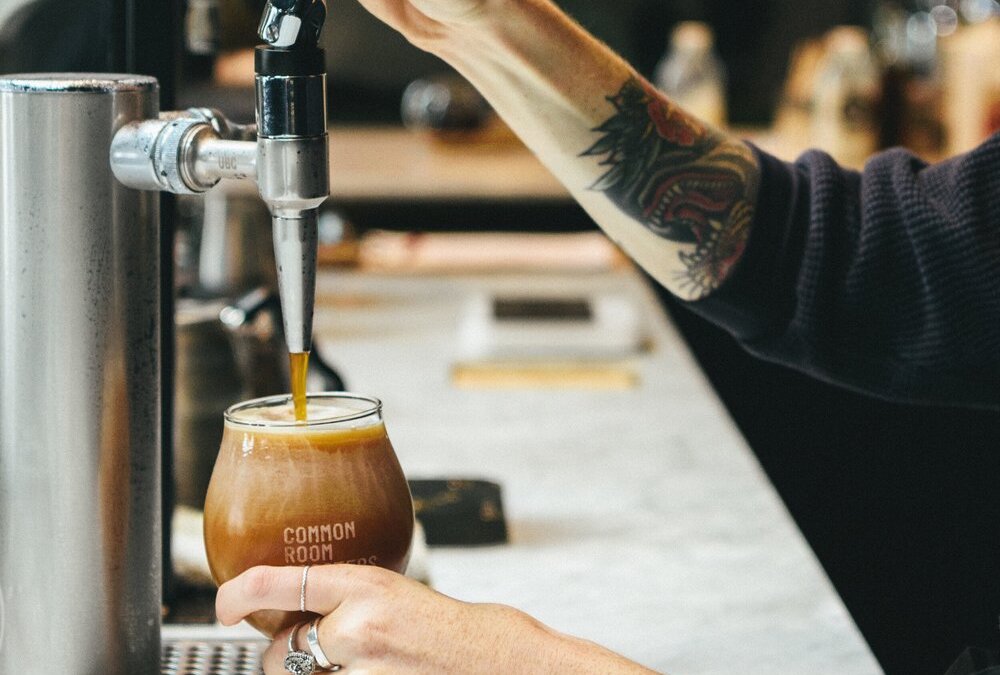 MAN SERVING COFFEE