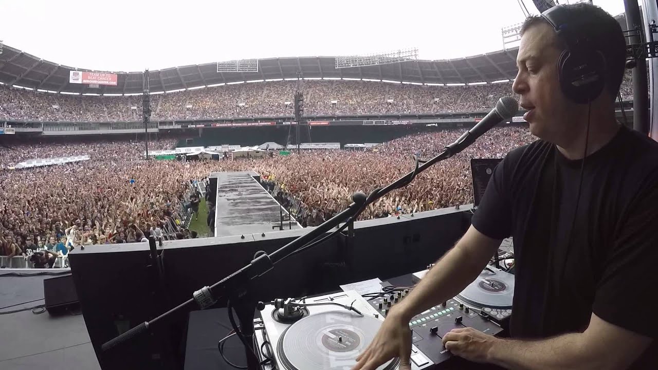 DJ Z-Trip playing dj set in front of crowded stadium