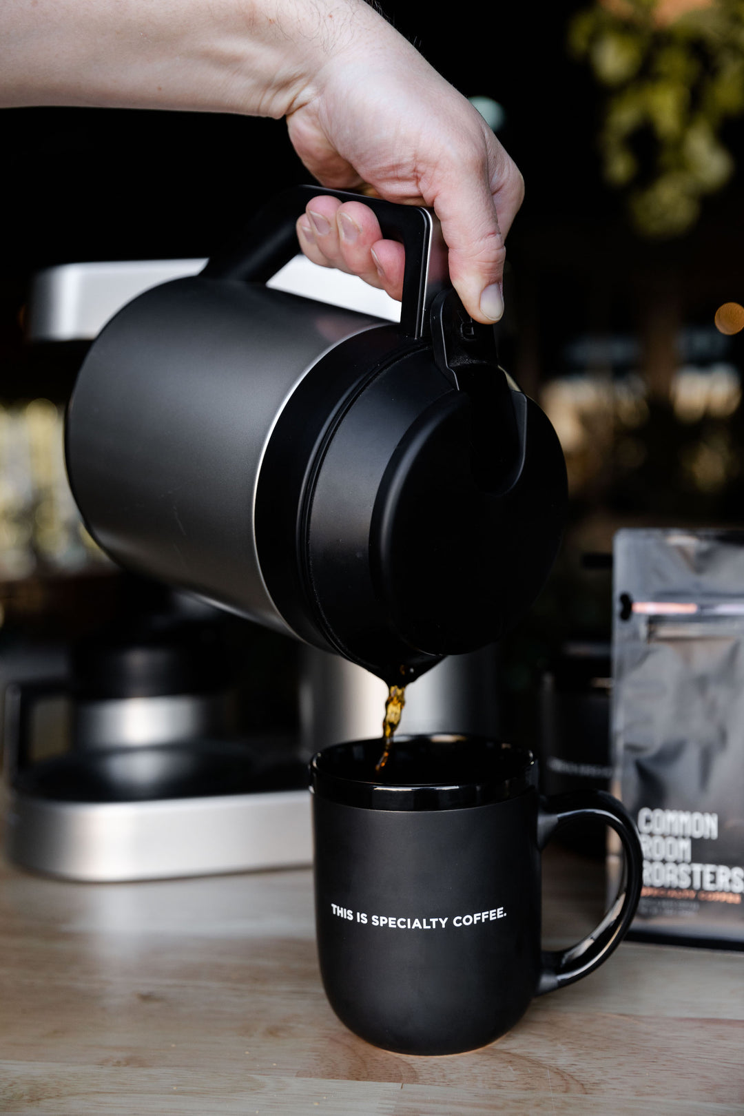 COFFEE BEING SERVED IN THE SPECIALTY COFFEE MUG